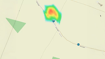 Heat map showing the detected location of a highly directive RF emission on a map.