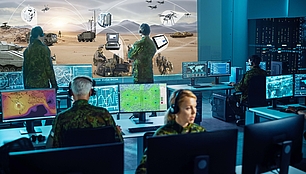 Defense Spectrum Operations Military control room with spectrum displays for defense communications and operational planning.
